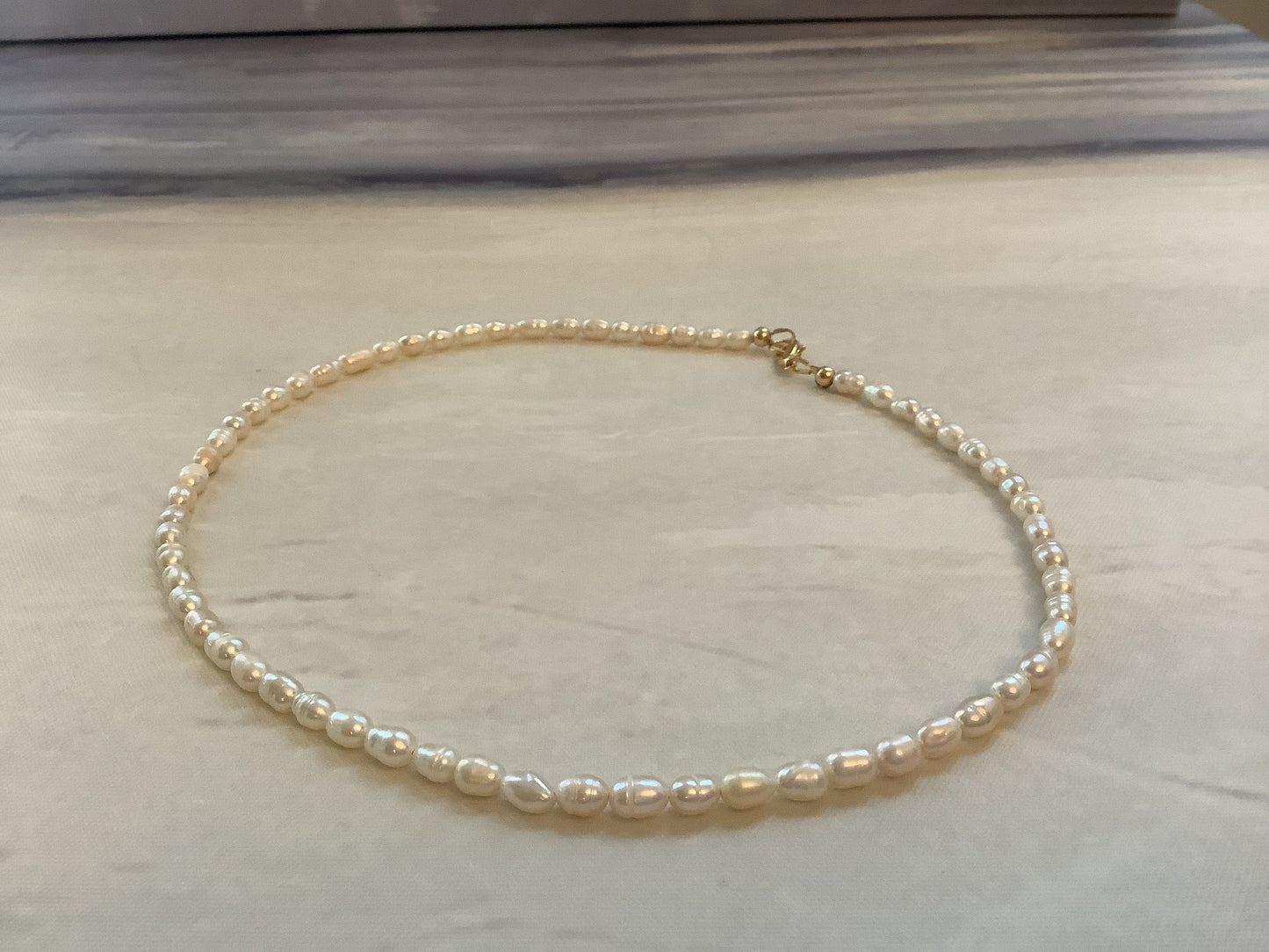 Eternal Elegance: Freshwater Pearl Necklace with Gold-Filled Clasp"